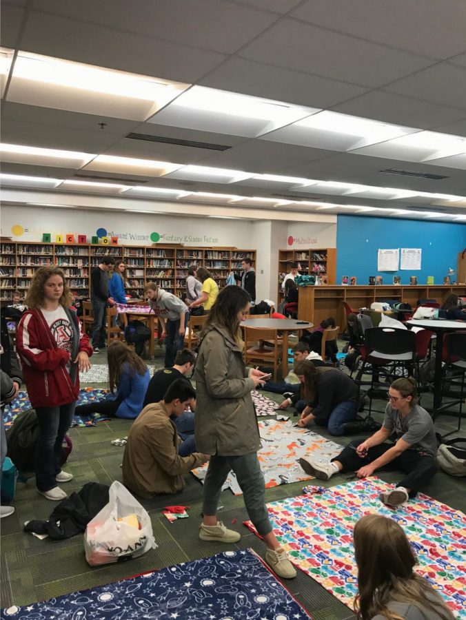 Jonathan Alder National Honors Society gathers to make no-sew blankets for children at Nationwide Childrens Hospital.