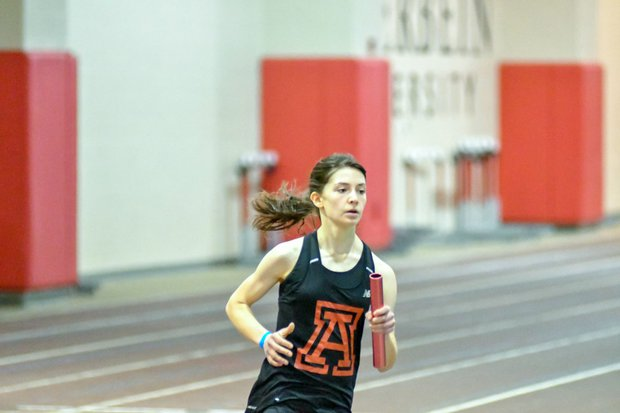 Sophomore Elaina Winslow competes in the 4x8. Photo provided by Coach Creps.