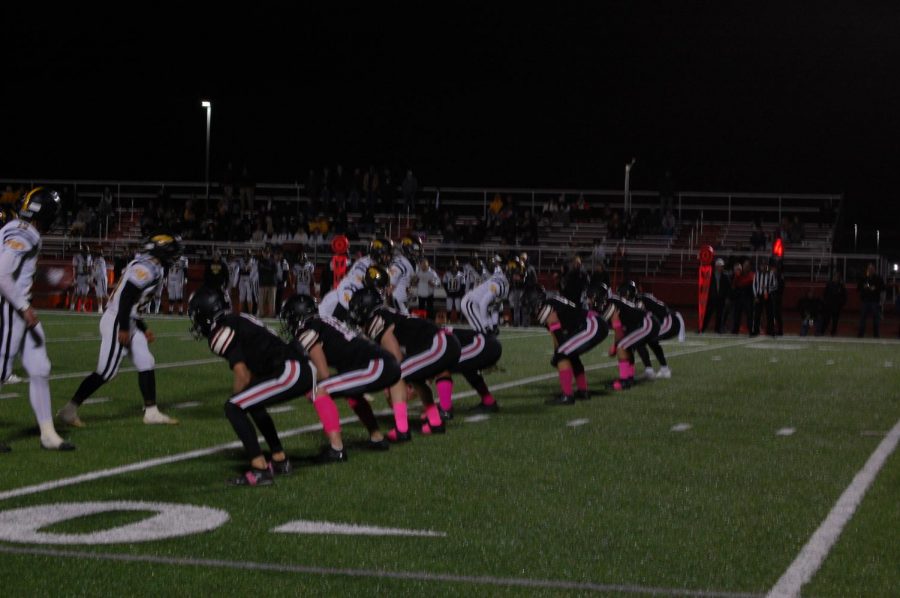 The Pioneer offensive line getting ready to hold back the Braves defense. 