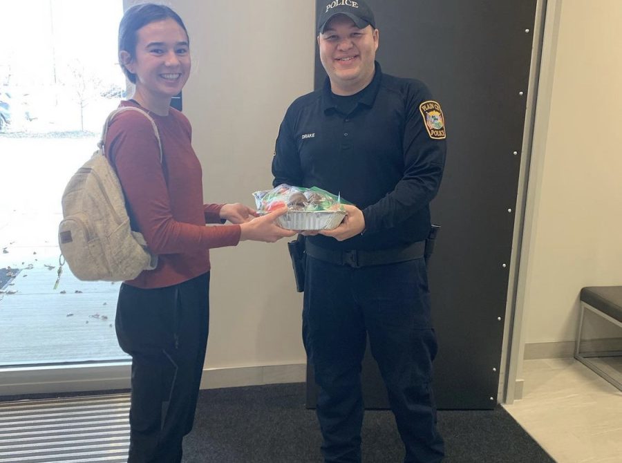 Junior Eliza Streit dropping off some cookies to the Plain City Police Department.