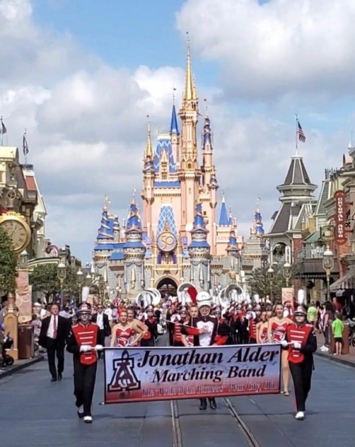 JAHS band marching on Main Street U.S.A infront of Cinderellas Castle 