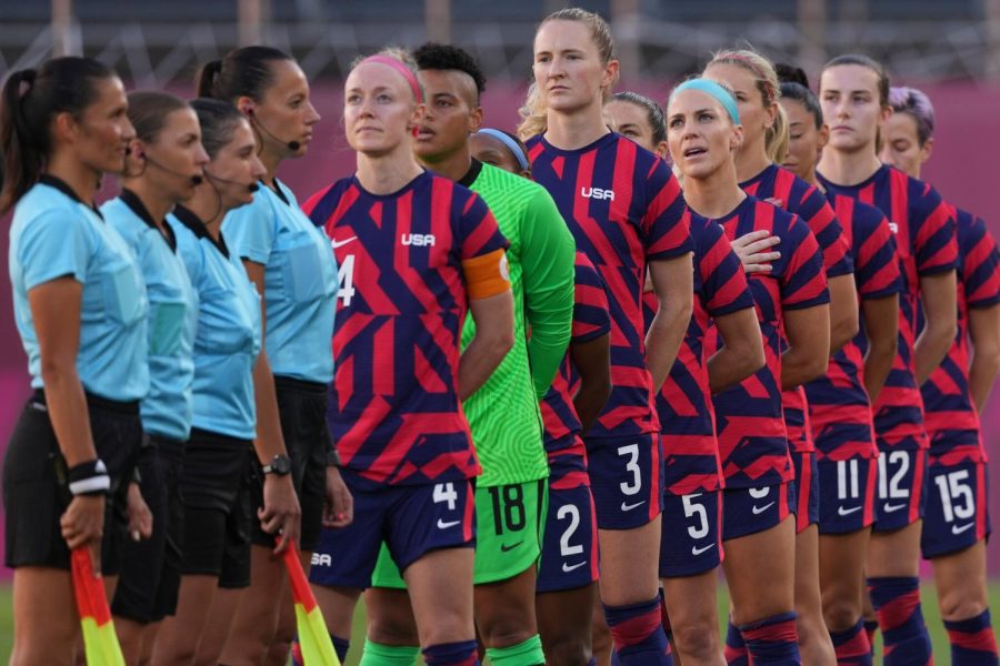 U.S Womens Soccer Team Lined  Up On The Field For The National Anthem
