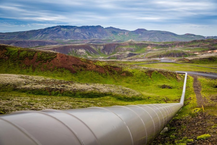 A pipeline stretches through a rural area. 