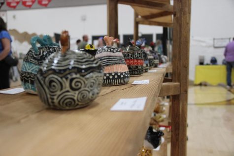 Students’ unique ceramic projects on display. 

