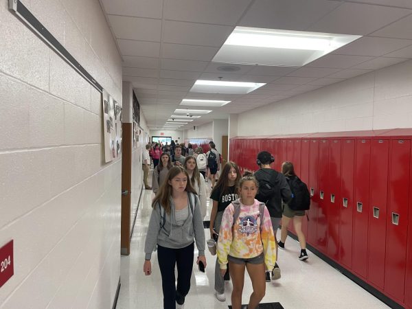 Students following traffic rules while walking down the hallway!