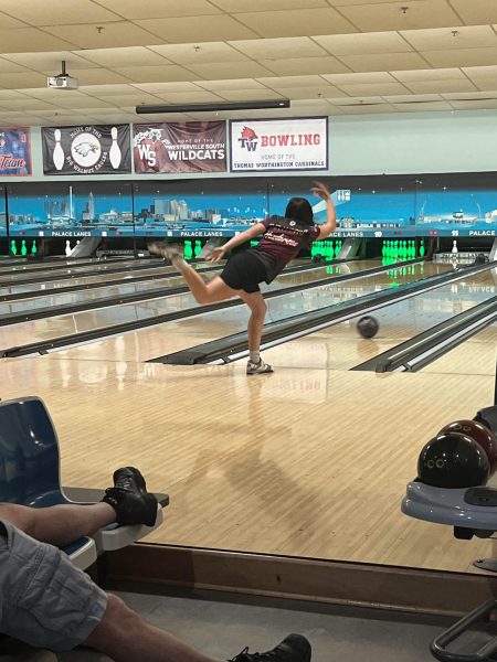 Senior Daisy Henderson releases her bowling ball. 