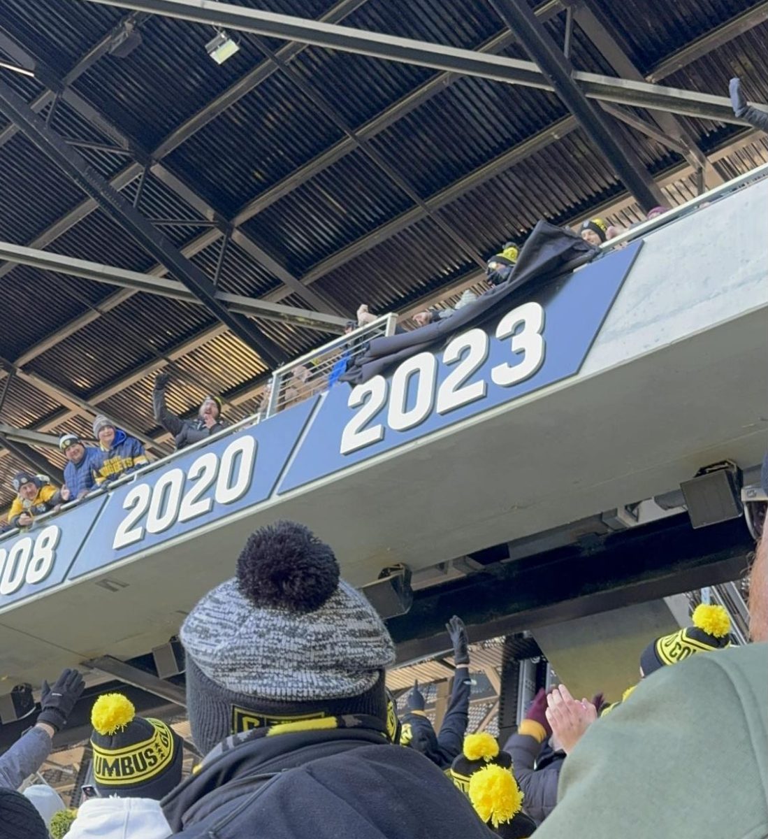 The Columbus Crew 2023 MLS cup wall banner is revealed to fans. 