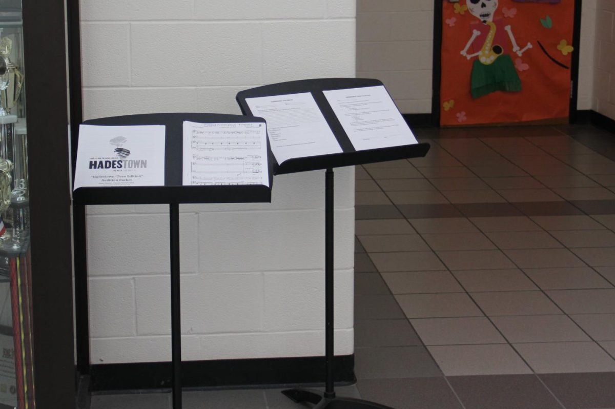 The sign up sheets and information sit outside the choir room.