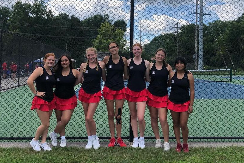 The tennis team poses for a photo at the Delaware Hayes tournament in August. 

Photo courtesy of @jagirlstennis on Instagram