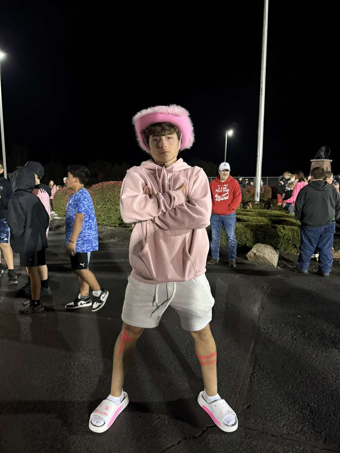 Fabrizio posing for a photo at the pink out football game this year.

Photo courtesy of Fabrizio Fiorini.