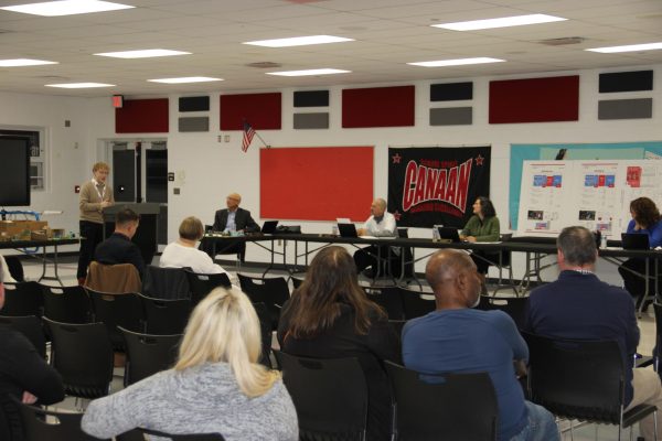 Photo taken during teacher and choral director Nicholas Mayes' speech to school board regarding the auditorium.