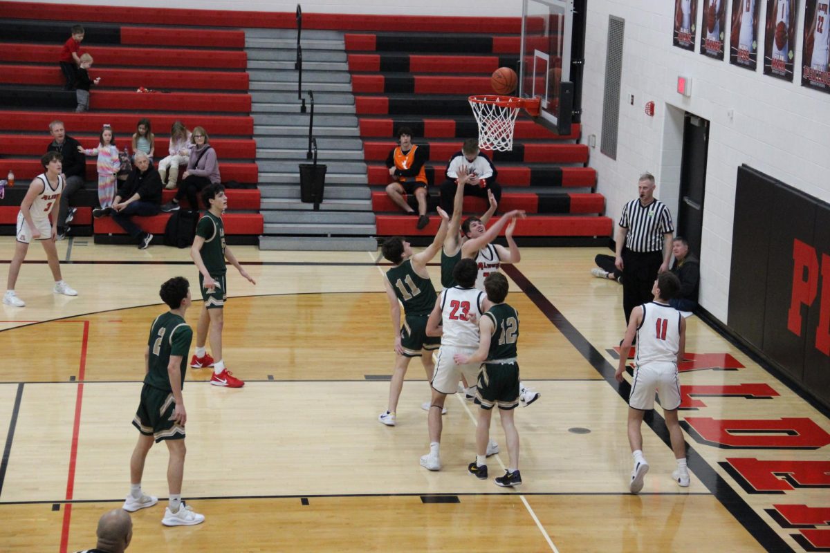 Junior Garrett Bauer shoots a 2 pointer.