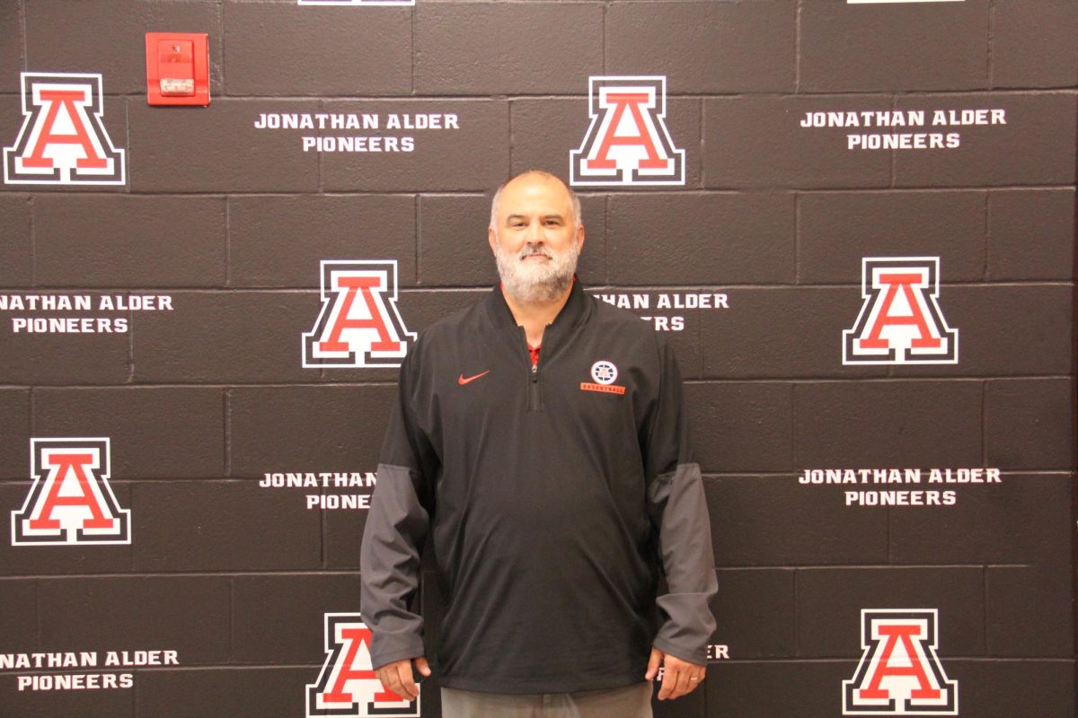 Clint Hayes in front of the new and improved athletic wing. 