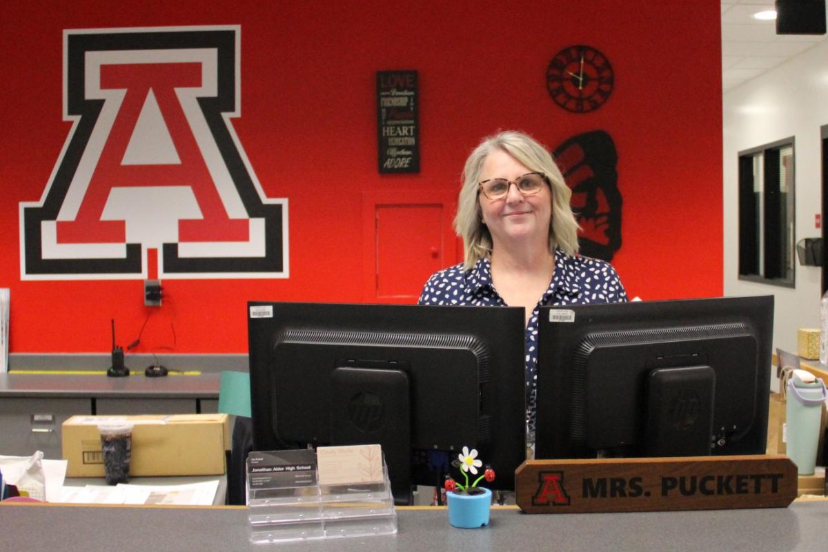 Mrs. Puckett at her desk.