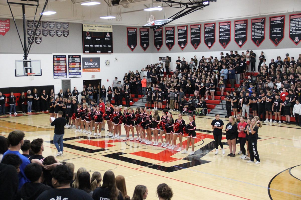 Girls Tennis, Cheerleading, and Cross-country teams lined up