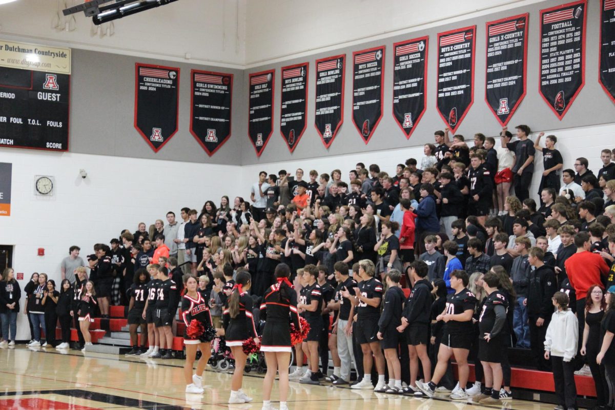 Freshmen section cheers for the spirit stick competition.