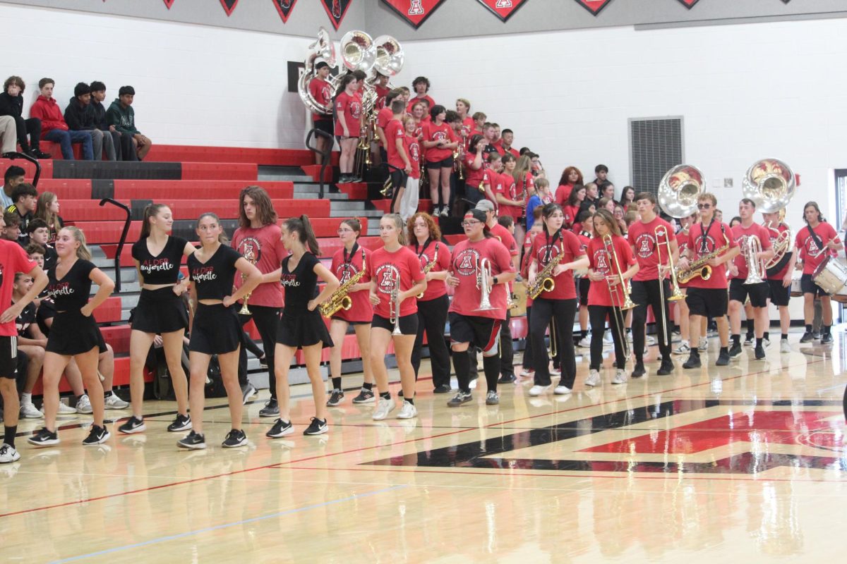 JA Marching Band marches in to start the pep rally.