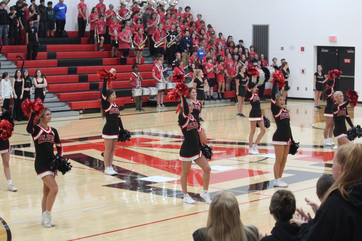 JA Cheerleaders cheer during the pep rally.