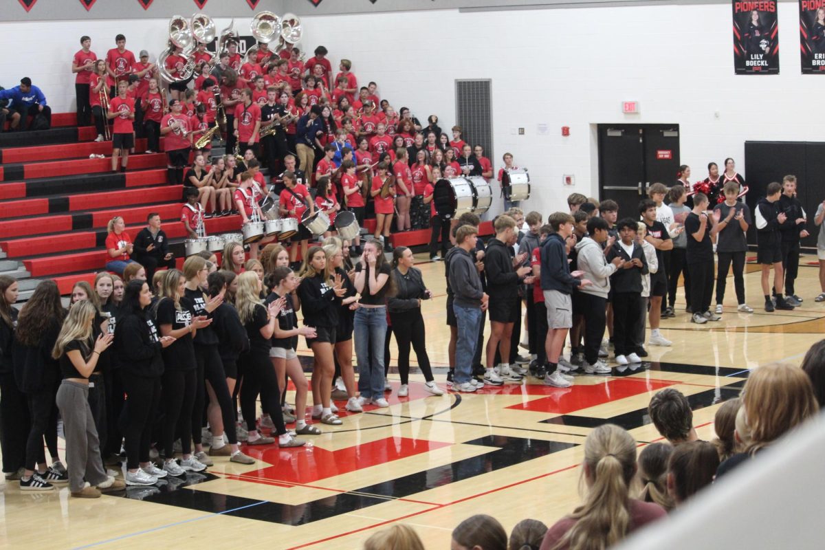 JA Golf, Soccer, Volleyball stand for recognition. 