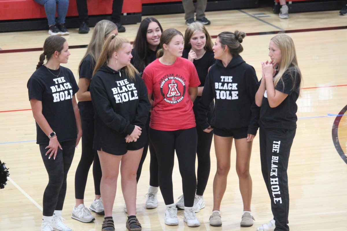 JA Girls Tennis team stands for recognition.
