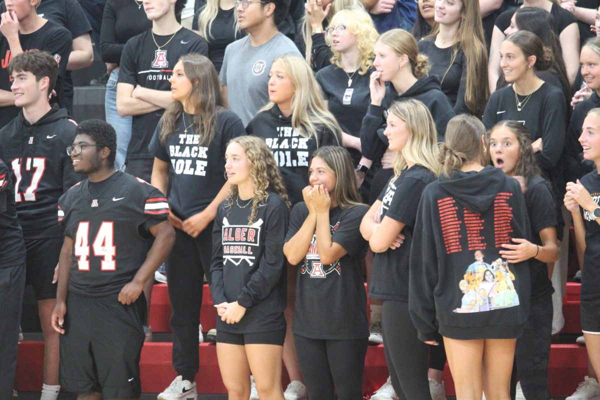 The audience is nervous to see if Garrett Bauer will score the ball.