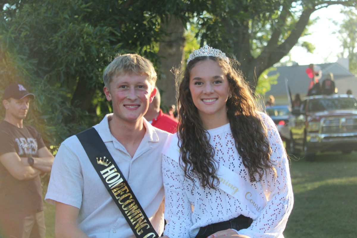 Jonathan Alder's final senior court members and our king and queen Calla Streit who is excorted by Mark Goode. (Eli Harriman)