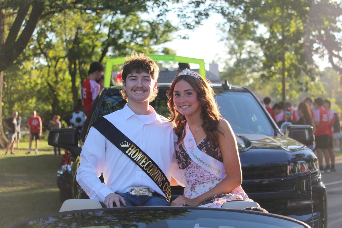 Jonathan Alder's first member of the Senior Court is Emiy Webb, who is escorted by Myles Guthrie. 