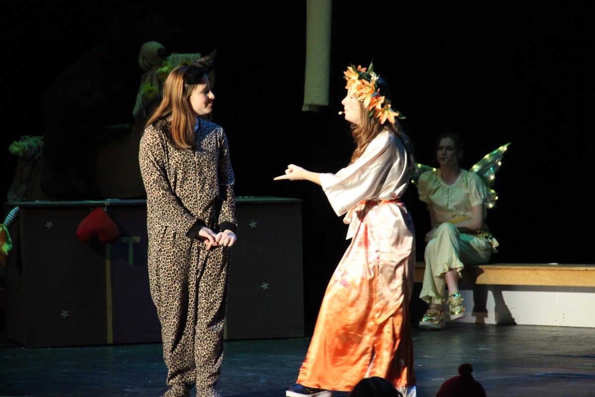 The Tiger Lily (Moran) talks to a lost boy (Dellapina).