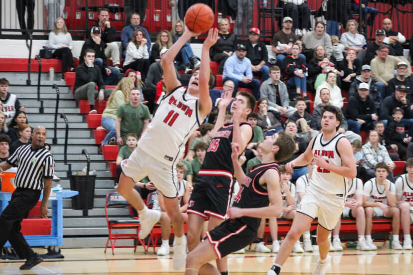 Danny Bentley goes for a layup shot. Photograph by Emma Colopy.
