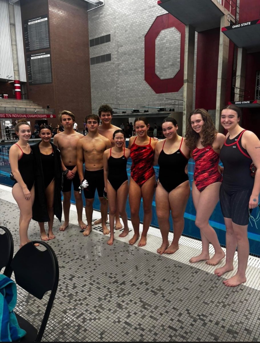 The swim team poses for a photo after their swim meet. 

Photo courtesy of Katie Bumgardner.
