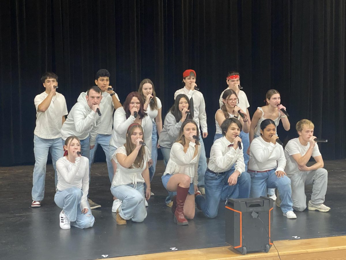 A Capella choir singing during a rehearsal.
