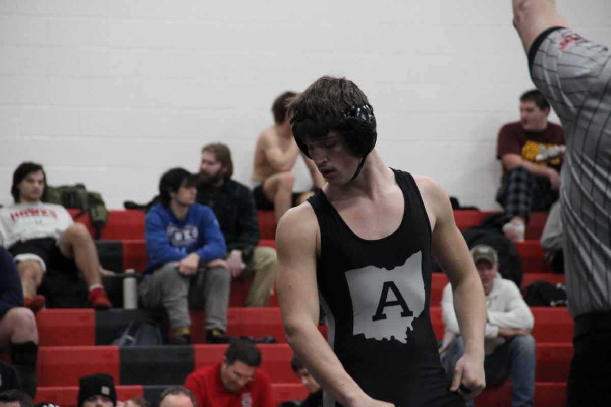 Junior Cameron Watkins in the middle of his match. 