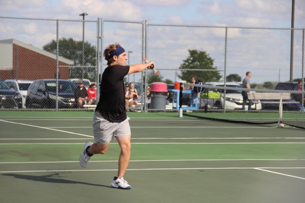 Senior Sean Gluntz after he hits the ball.
