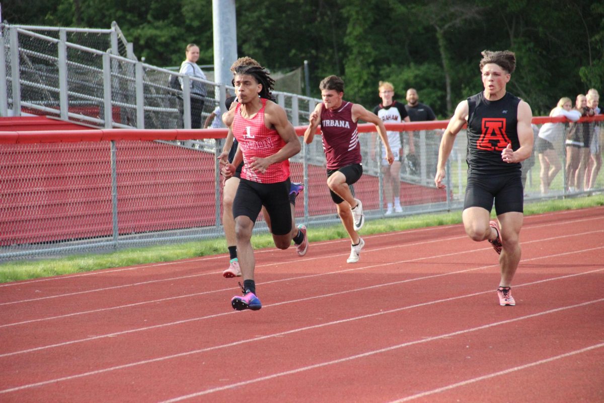 Sophomore Grayson Adams runs the 100 meter dash.